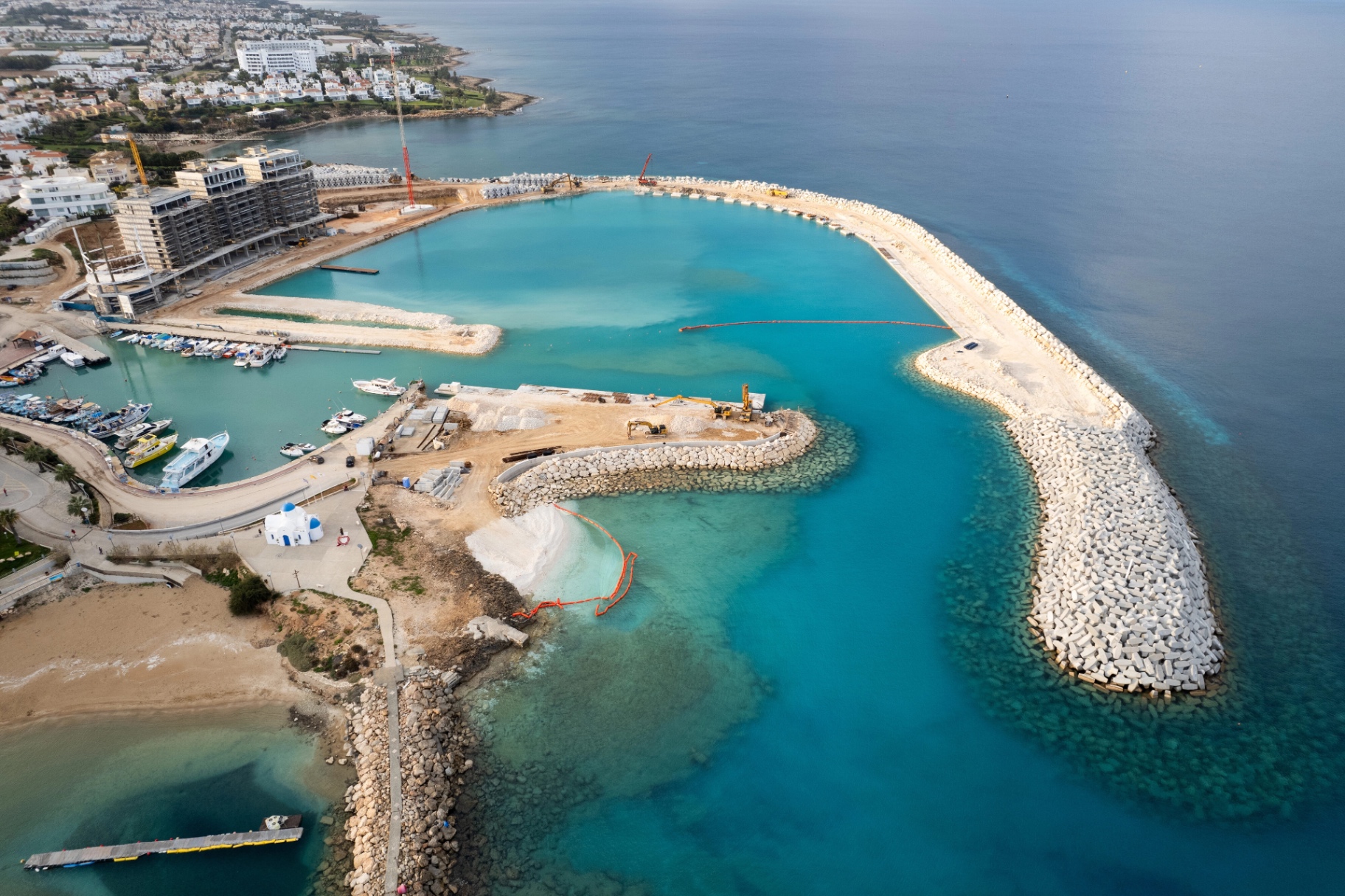 Aerial view of a coastal residential development under construction